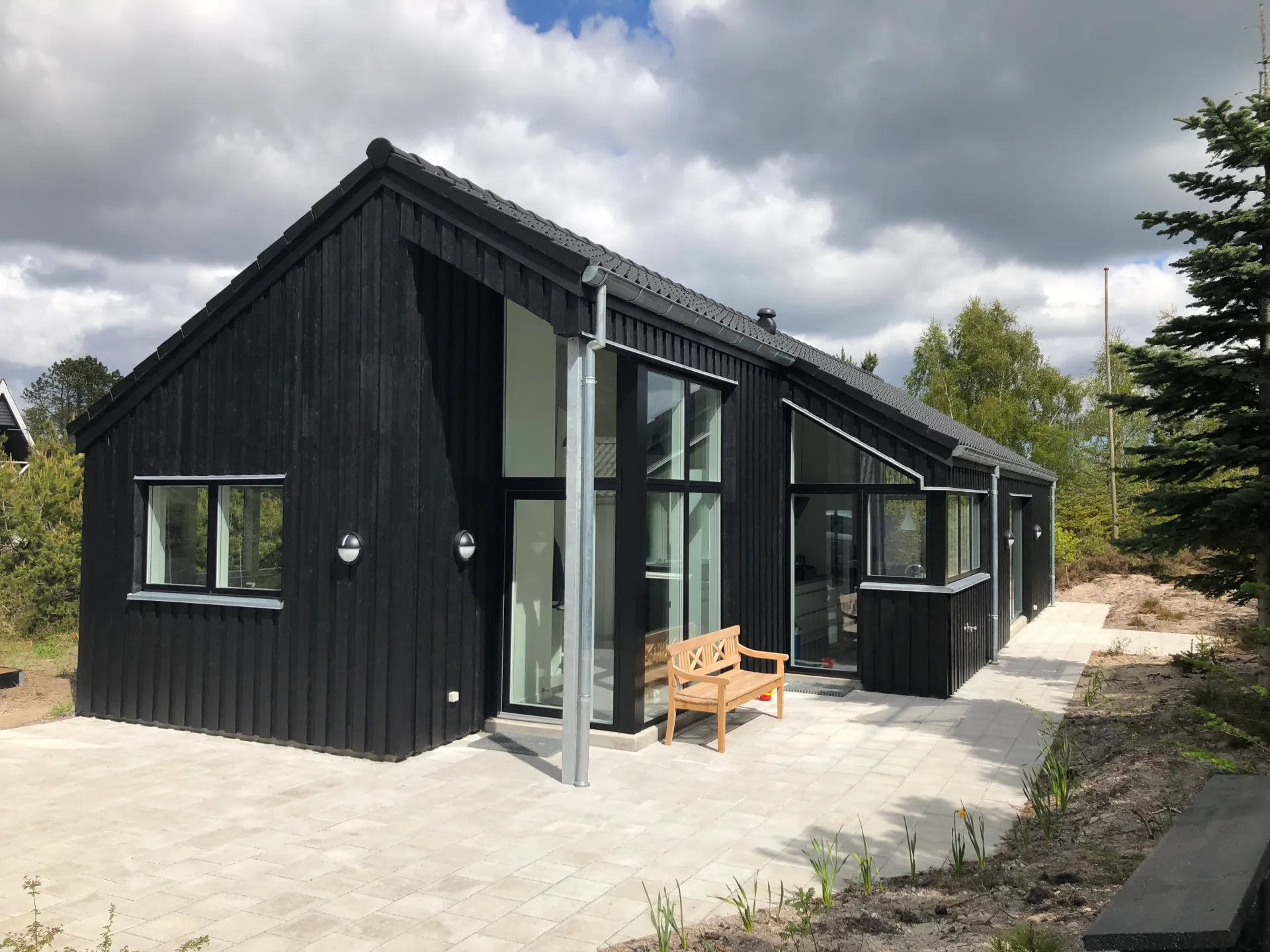Stue i sommerhus i Hals — Arkitekttegnestuen Yderskov